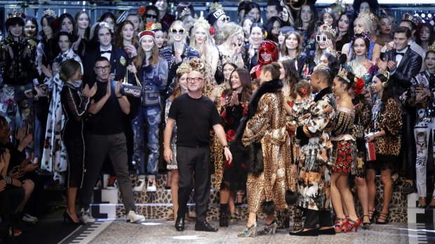 Stefano Gabbana, left, and Domenico Dolce take the catwalk at the end of the presentation of their Dolce&Gabbana women's Fall-Winter 2017-2018 collection.