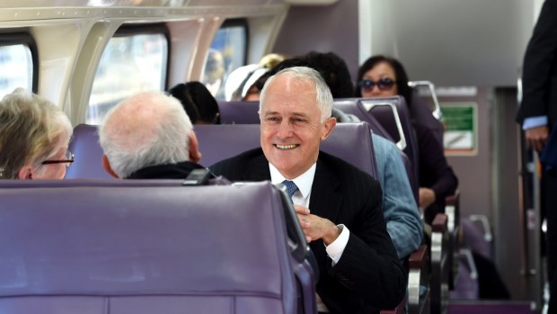 Prime Minister Malcolm Turnbull on a train in Sydney's west.