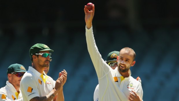 Nathan Lyon celebrates after taking the wicket of Ishant Sharma during day four of the First Test.