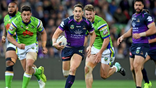 Streaker: Billy Slater shows a clean set of heels to the Raiders defence.