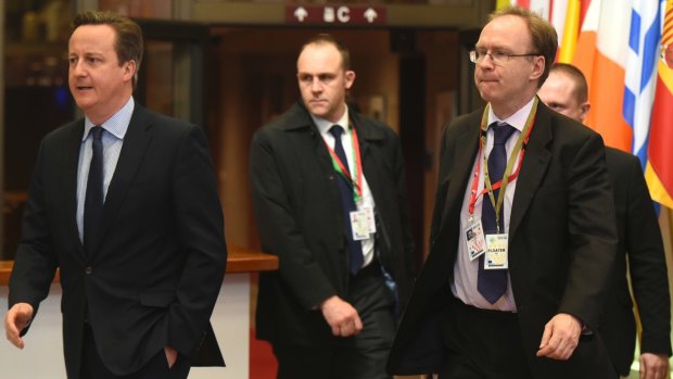 Former British Prime Minister David Cameron (left) in Brussels last year with Britain's permanent representative to European Union Ivan Rogers (far right). Mr Rogers has resigned just three months before formal Brexit talks begin.