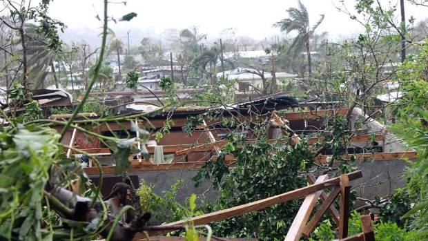Buildings shorn of their roofs in Port Vila, Vanuatu's capital.
