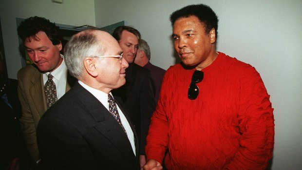 John Howard with Muhammad Ali at the AFL grand final.