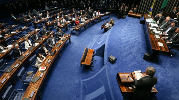 Members of the senate attend a session of the lower house to vote on the impeachment of Dilma Rousseff in Brasilia on Wednesday.