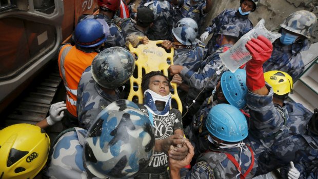 A 15-year-old boy was plucked from the rubble five days after the massive earthquake.