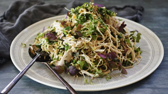 Swap a large dinner for a substantial lunch, such as this poached chicken and soba noodle salad with chunky nut sriracha dressing (