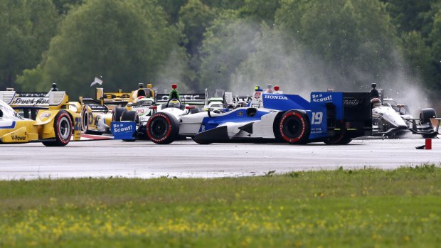 Francesco Dracone (19), of Italy, spins out on turn one during the IndyCar Grand Prix of Louisiana. He collided with a pit worker on lap 25.