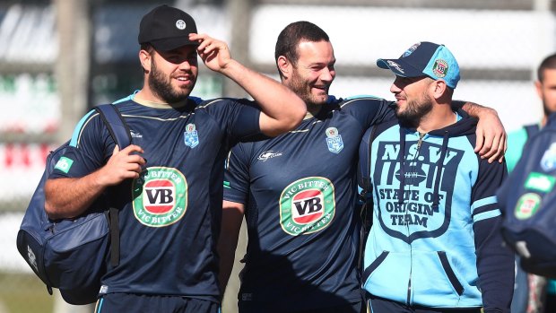 All smiles: Wade Graham, Boyd Cordner and Jack Bird share a laugh on Saturday at NSW training.