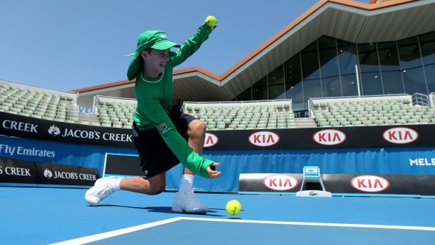  Ballkid Max Hartnett practices on Showcourt 3 at Melbourne Park  in preparation for the upcoming Australian Open.