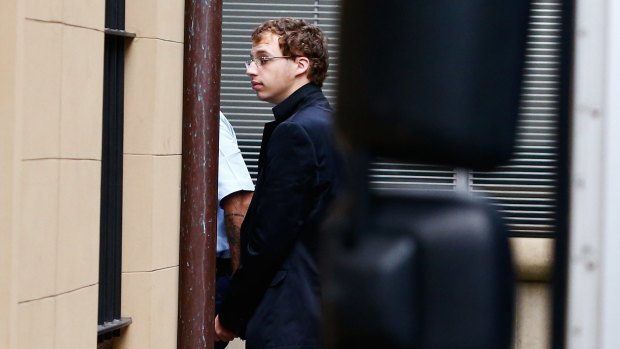 Guilty: Daniel Jack Kelsall is led into the Supreme Court from a prison truck to attend his trial on Wednesday.