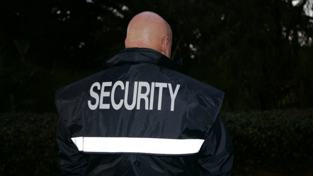 The security guard (generic photo, not Mr Alpert) allegedly traded on information from a confidential document he had printed out for his employer.