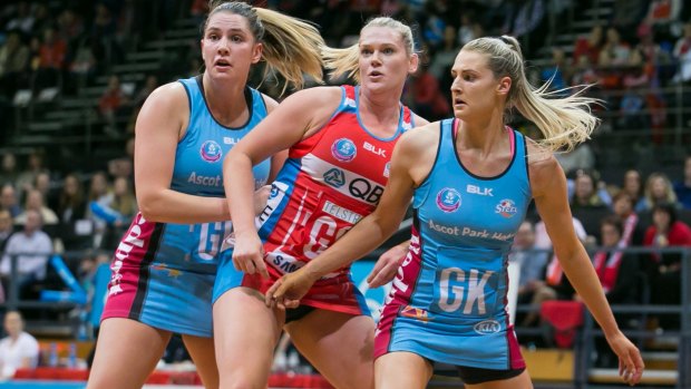 Stalemate: Caitlin Thwaites is surrounded as the Swifts take on the Southern Steel at Sydney Olympic Park Sports Centre.