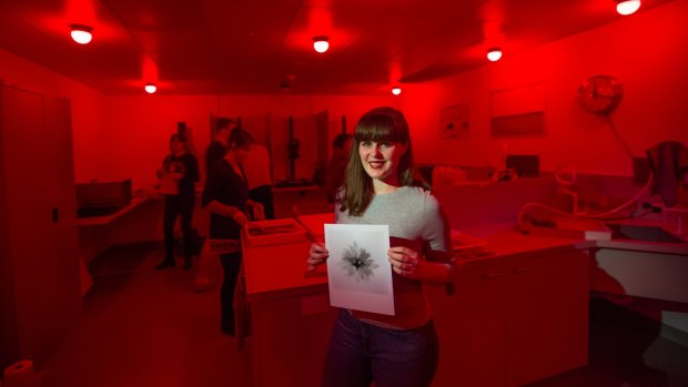 Student April Brown in the recently opened darkroom at Deakin University's Waterfront campus in Geelong. 