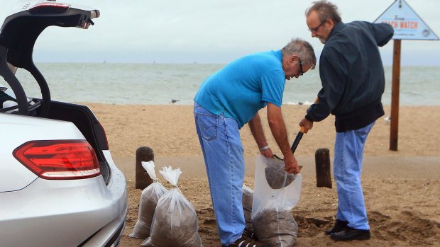 Residents prepare sandbags as Hurricane Harvey approaches.
