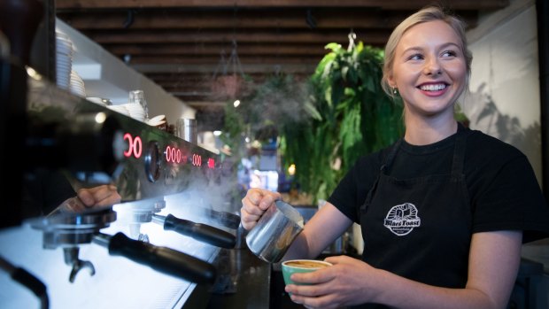 Isabella Valentini prepares coffee at Black Toast cafe in Annandale, Sydney.