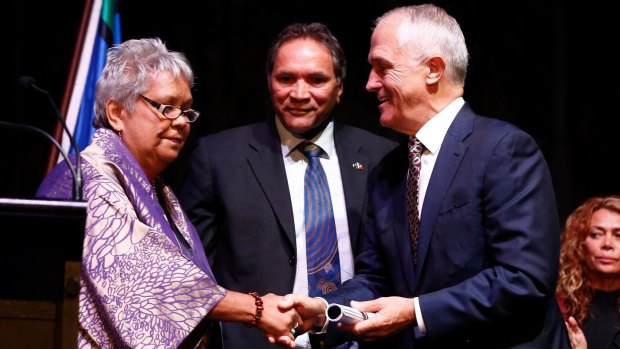 National Congress of Australia's First People's co-chairs Dr Jackie Huggins and Rod Little present the Redfern Statement to Prime Minister Malcolm Turnbull on Tuesday.