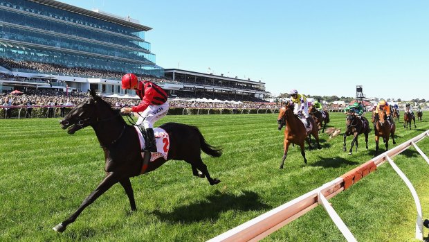Glyn Schofield rides Prized Icon to win the Victoria Derby at Flemington Racecourse.