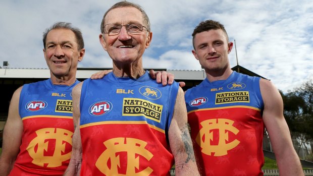 Former Fitzroy champions (L-R) Gary Wilson and Kevin Murray with Brisbane Lions player Pearce Hanley at the Junction Oval on Friday. 