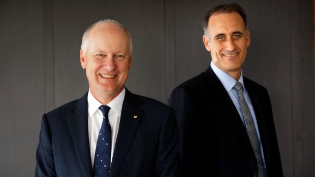 Outgoing CEO Richard Goyder (left) and his replacement Rob Scott.