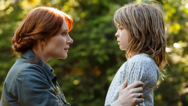 Bryce Dallas Howard (left) is Grace and Oakes Fegley is Pete in Pete's Dragon.  