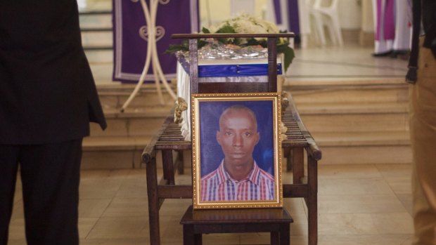 A portrait of Egide Niyongere displayed in front of his coffin during his funeral earlier this month.