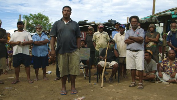 PNG land rights activist Joseph Moses (foreground) in a scene from the film.