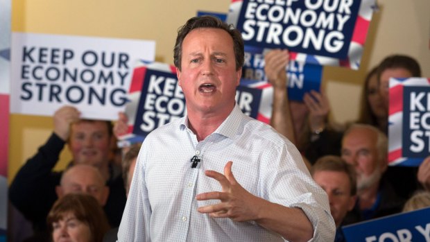 British Prime Minister David Cameron speaks to party supporters gathered inside the village hall in Norton-sub-Hamdon in the Yeovil constituency last Sunday.