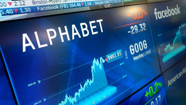 Alphabet stock is shown on a screen at the Nasdaq MarketSite.