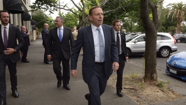 Prime Minister Tony Abbott and treasurer Joe Hockey leave the lunch at Lamaro's in South Melbourne.