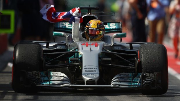 On top: Lewis Hamilton claims his sixth title in Montreal at the Canadian GP.