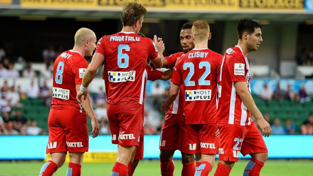 Thanks mate: Erik Paartalu celebrates his goal against Perth, but City had to settle for a draw.
