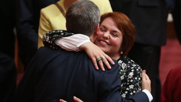 Senator Kimberley Kitching is embraced by Opposition Leader Bill Shorten after her first speech in the Senate last year.