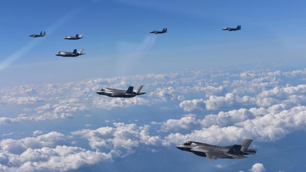 US Air Force F-35 stealth fighter jets and South Korean F-15 fighter jets fly over the Korean Peninsula.