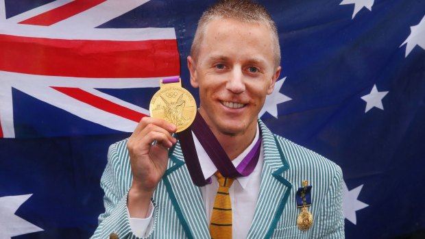 Jared Tallent with his retrospectively awarded London gold medal 