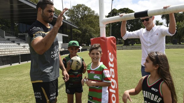 Captain Bunny: South Sydney captain Greg Inglis promoting health care with young children at Redfern Oval on Tuesday.