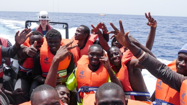 Migrants on board a rescue boat.