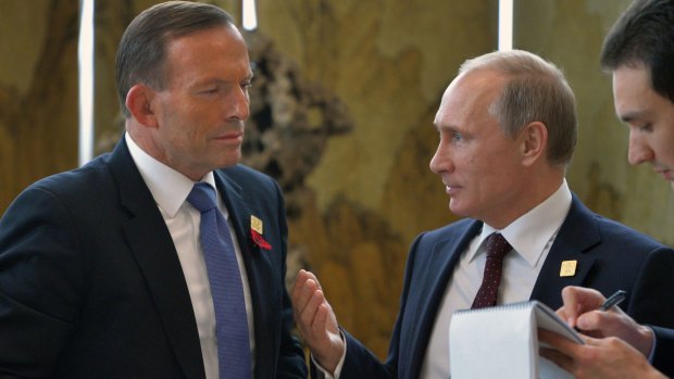 Tony Abbott and Vladimir Putin at the APEC meeting in Beijing in 2014. 