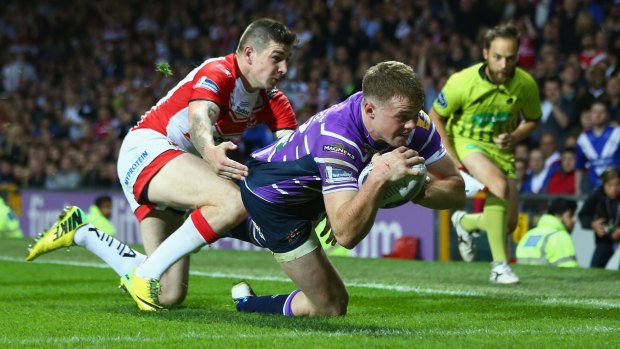 Real talent: Joe Burgess scores for Wigan against St Helens in October.