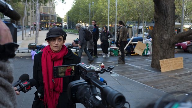 Protest spokesperson Lisa Peterson speaks to the media after City of Melbourne officers ordered the dismantling of the rough sleepers' camp.