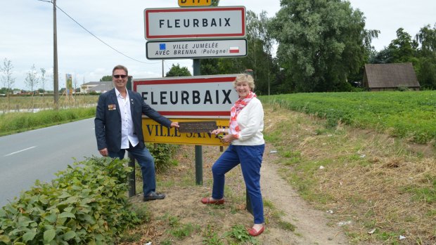 Victor Offe's grandchildren, Paul Fullston and Victoria Petho, return their grandfather's "Fleurbaix" sign to the Western Front, 100 years on.