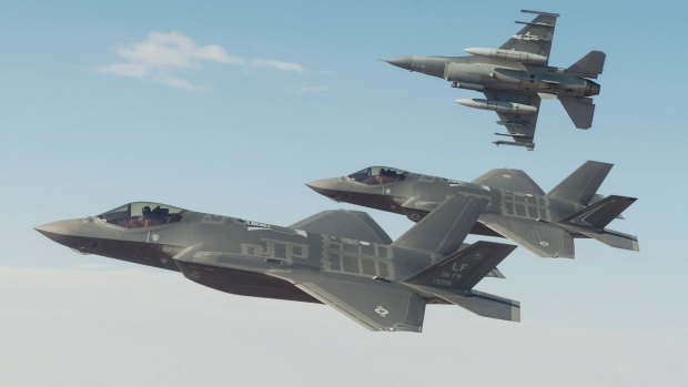 A Royal Australian Air Force F-35A flies in formation with a US Air Force F-35 and F-16 during trial flights from Luke Air Force Base in Arizona.