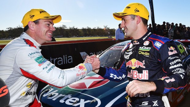 Podium: Craig Lowndes is congratulated by Jamie Whincup.