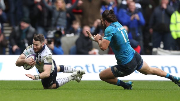 Tommy Seymour crosses the line for Scotland.