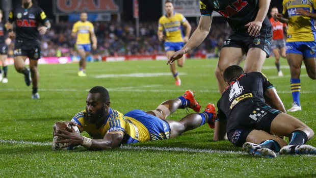 Touch down: Semi Radradra of the Eels dives over to score. 