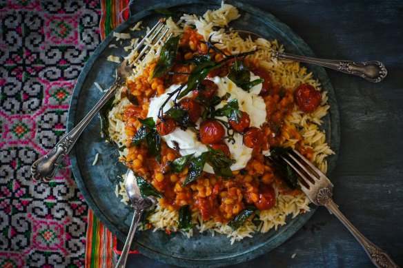 Tomato dhal topped with yoghurt and panch phoran roasted tomatoes.