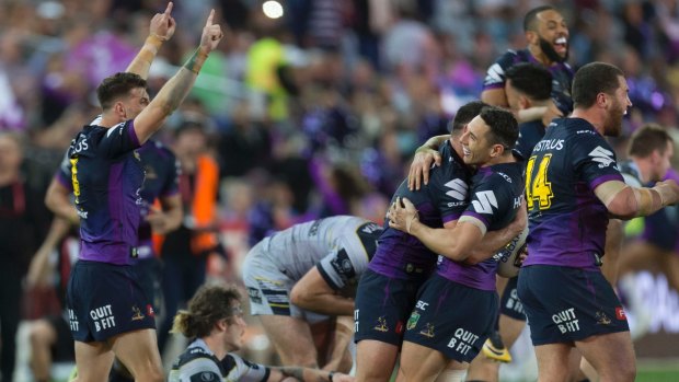 That winning feeling: Melbourne Storm celebrate at the final whistle.