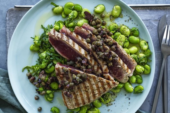 Barbecued tuna steaks with broad beans and roughly chopped  tapenade.