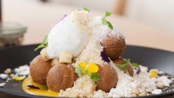 Belgian waffle balls with passionfruit cream, banana crumb and pandan ice-cream at Abbotsford cafe AU79.