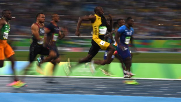 Usain Bolt of Jamaica on his way to winning the Men's 100 metre final.