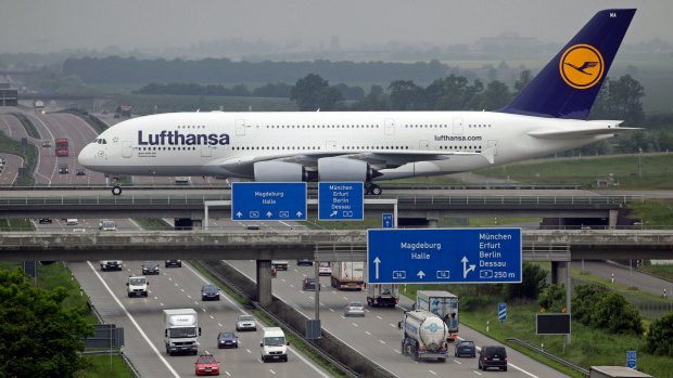 A Lufthansa A380 drives over a bridge over the A14 motorway at the airport in Leipzig, Germany, 01 June 2010.